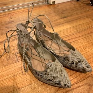 Laceup snakeskin flats